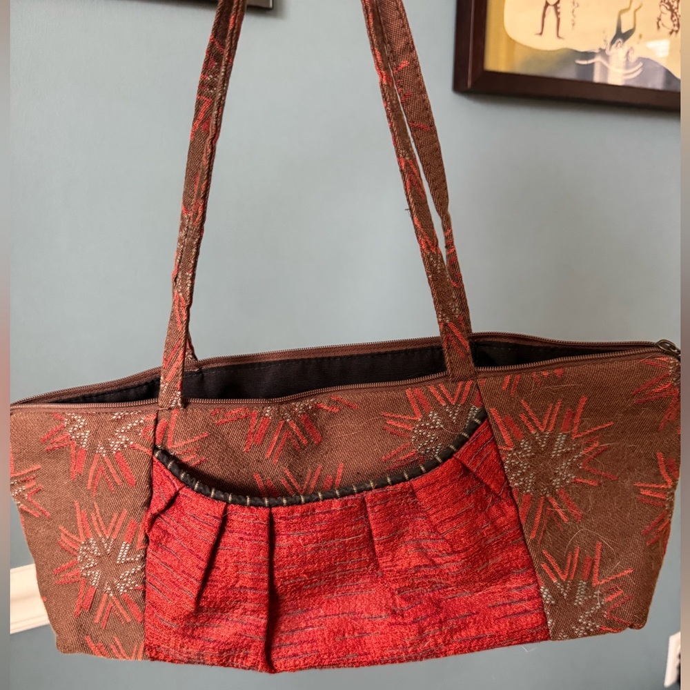 Maruca purse — rust red,teal blue, black, brown.